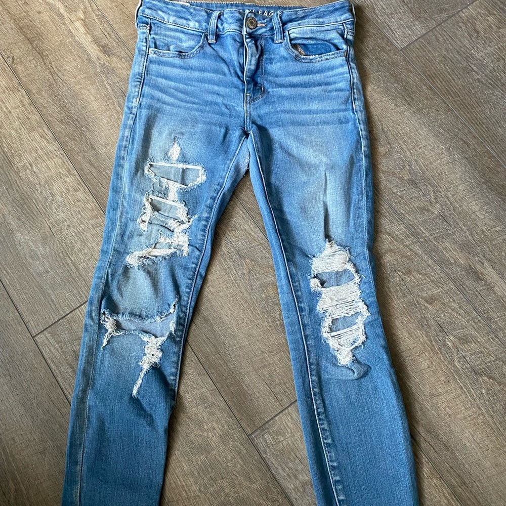 American Eagle Next Level Stretch blue ripped jeans